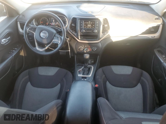 2015 Jeep Cherokee Sport with VIN 1C4PJLAB8FW663173, listed as a Copart auction lot 81185614 with 126,738 mi miles and Salvage title. Bid and sale history available at DreamBid. Image 8.