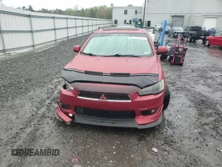 2009 Mitsubishi Lancer GTS with VIN JA3AU86W99U002899, listed as a Copart auction lot 52886455 with 174,184 mi miles and Salvage Title. Bid and sale history available at carsss.com. Image 10.