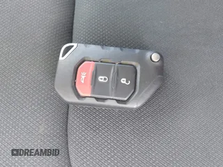 2018 Jeep Wrangler Unlimited Sahara with VIN 1C4HJXEN1JW236779, listed as a IAAI auction lot 42238158 with 72,879 mi miles and . Bid and sale history available at DreamBid. Image 11.