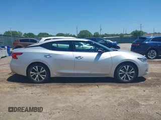 2016 Nissan Maxima SV z VIN 1N4AA6AP4GC434730, wystawiony jako IAAI lot #42231308 z przebiegiem 42 239 mil mil oraz . Historia ofert i sprzedaży dostępna na DreamBid. Obrazek 13.