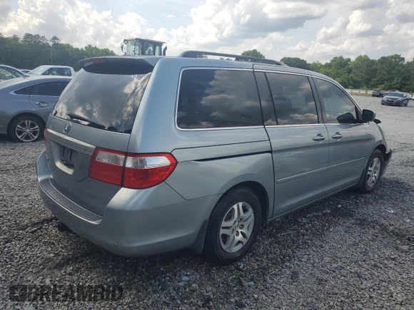 2006 Honda Odyssey EX with VIN 5FNRL38486B091892, listed as a Copart auction lot 53134035 with 154,449 mi miles and Salvage title. Bid and sale history available at DreamBid. Image 3.