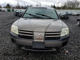 2004 Mitsubishi Endeavor LS with VIN 4A4MN21S74E013411, listed as a Copart auction lot 43638495 with 265,778 mi miles and Salvage Title. Bid and sale history available at carsss.com. Image 5.