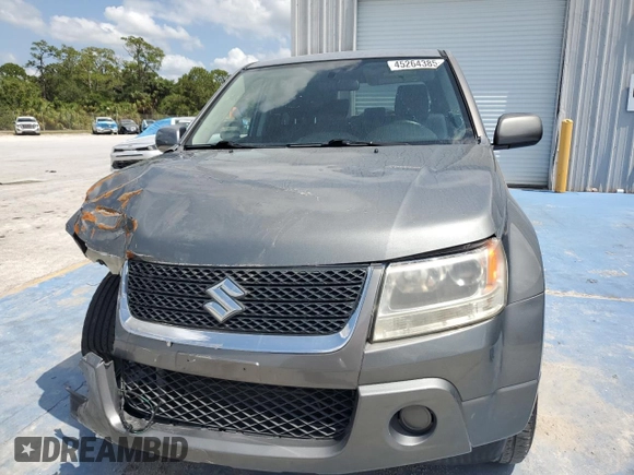 2009 Suzuki Grand Vitara with VIN JS3TD042694100821, listed as a Copart auction lot 57209065 with 89,362 mi miles and Salvage title. Bid and sale history available at DreamBid. Image 5.