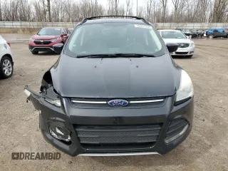 2014 Ford Escape SE with VIN 1FMCU9G99EUC91684, listed as a Copart auction lot 50951555 with 143,887 mi miles and Clean Title. Bid and sale history available at carsss.com. Image 5.