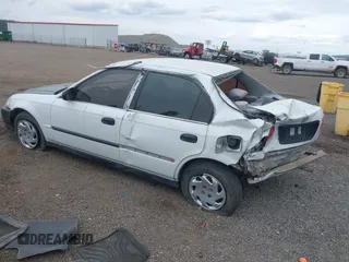1998 Honda Civic DX with VIN 2HGEJ6629WH551418, listed as a IAAI auction lot 42137262 with 180,704 mi miles. Bid and sale history available at carsss.com. Image 3.