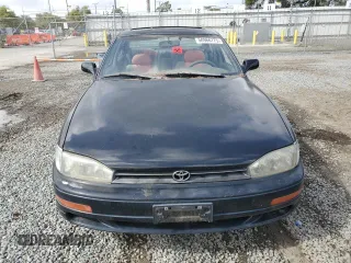 1994 Toyota Camry XLE with VIN JT2GK13E0R0012242, listed as a Copart auction lot 50966775 with 70,922 mi miles and Salvage Title. Bid and sale history available at carsss.com. Image 5.