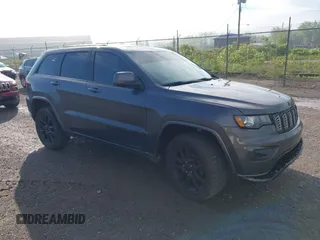 2017 Jeep Grand Cherokee Laredo with VIN 1C4RJFAG1HC744669, listed as a IAAI auction lot 42269885 with 123,271 mi miles and . Bid and sale history available at DreamBid. Image 1.