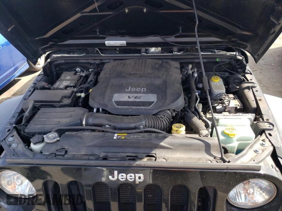 2018 Jeep Wrangler JK Unlimited Sport S with VIN 1C4BJWDG9JL812395, listed as a Copart auction lot 76397134 with 64,866 mi miles and Salvage Title. Bid and sale history available at carsss.com. Image 11.