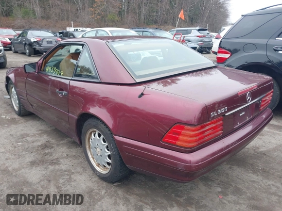 1997 Mercedes-Benz SL-Class with VIN WDBFA67F3VF142320, listed as a IAAI auction lot 41835593 with 172,151 mi miles. Bid and sale history available at carsss.com. Image 3.