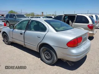 2004 Oldsmobile Alero GX z VIN 1G3NK52F64C145059, wystawiony jako IAAI lot #42239408 z przebiegiem 144 422 mil mil oraz . Historia ofert i sprzedaży dostępna na DreamBid. Obrazek 3.