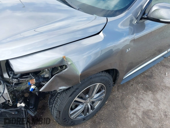 2020 Infiniti QX60 Luxe z VIN 5N1DL0MNXLC523376, wystawiony jako IAAI lot #41189601 z przebiegiem 47 655 mil mil oraz . Historia ofert i sprzedaży dostępna na DreamBid. Obrazek 20.