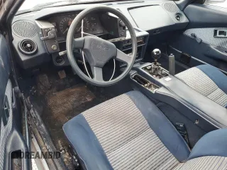 1989 Toyota MR2 z VIN JT2AW15C2K0146245, wystawiony jako Copart lot #87315874 z przebiegiem 162 741 mil mil oraz Tytuł czysty. Historia ofert i sprzedaży dostępna na DreamBid. Obrazek 8.
