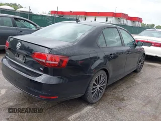 2016 Volkswagen Jetta Sport z VIN 3VWD17AJ5GM244200, wystawiony jako IAAI lot #42340056 z przebiegiem 111 012 mil mil oraz . Historia ofert i sprzedaży dostępna na DreamBid. Obrazek 4.