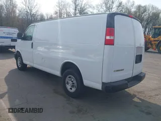 2017 Chevrolet Express Cargo Van with VIN 1GCWGAFF5H1133267, listed as a IAAI auction lot 42124337 with 162,899 mi miles. Bid and sale history available at carsss.com. Image 3.