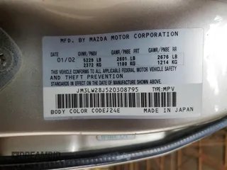 2002 Mazda MPV LX with VIN JM3LW28J520308795, listed as a Copart auction lot 50701835 with 181,086 mi miles and Salvage title. Bid and sale history available at DreamBid. Image 13.