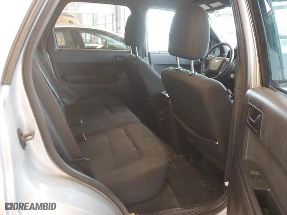 2010 Ford Escape XLT with VIN 1FMCU0D70AKB09942, listed as a IAAI auction lot 41572582 with 218,296 mi miles. Bid and sale history available at carsss.com. Image 8.