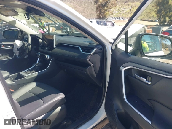 2024 Toyota RAV4 Hybrid XLE Premium with VIN JTMB6RFV3RJ059534, listed as a IAAI auction lot 41716721 with 6,319 mi miles. Bid and sale history available at carsss.com. Image 5.