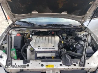 2000 Oldsmobile Intrigue GLS z VIN 1G3WX52H0YF233648, wystawiony jako Copart lot #72619824 z przebiegiem Nie podano mil oraz Nie do naprawy. Historia ofert i sprzedaży dostępna na DreamBid. Obrazek 13.