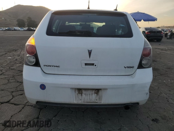 2009 Pontiac Vibe w/1SA with VIN 5Y2SL67809Z439030, listed as a Copart auction lot 87419194 with 104,518 mi miles and Salvage Title. Bid and sale history available at carsss.com. Image 6.