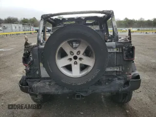2018 Jeep Wrangler Unlimited Sport S с VIN 1C4BJWDG7JL821760, выставлен на аукционе Copart как лот 53657455 с пробегом Не указан миль и Списание • Salvage title. История ставок и продаж доступна на DreamBid. Изображение 6.