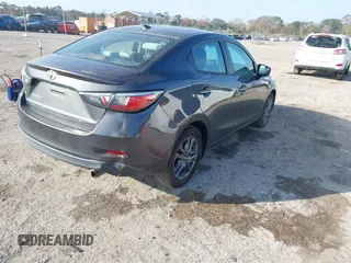 2019 Toyota Yaris Sedan L with VIN 3MYDLBYVXKY506966, listed as a IAAI auction lot 41455800 with 106,284 mi miles. Bid and sale history available at carsss.com. Image 4.