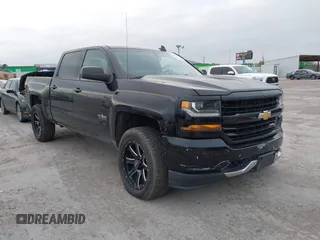 2017 Chevrolet Silverado 1500 LT with VIN 1GCUKREC2HF208232, listed as a IAAI auction lot 40933445 with 105,928 mi miles and . Bid and sale history available at DreamBid. Image 1.