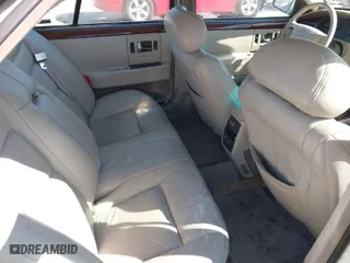 1996 Cadillac Seville Touring STS with VIN 1G6KY5298TU815539, listed as a IAAI auction lot 41665242 with 151,736 mi miles. Bid and sale history available at carsss.com. Image 8.