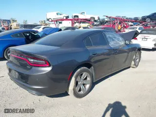 2018 Dodge Charger SXT Plus with VIN 2C3CDXHG5JH176183, listed as a IAAI auction lot 41167642 with 162,938 mi miles. Bid and sale history available at carsss.com. Image 4.