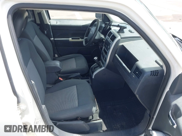 2008 Jeep Patriot Sport with VIN 1J8FT28038D647491, listed as a IAAI auction lot 42279472 with 164,527 mi miles and . Bid and sale history available at DreamBid. Image 5.