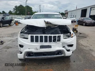 2015 Jeep Grand Cherokee Overland with VIN 1C4RJFCGXFC891616, listed as a Copart auction lot 61386065 with 90,011 mi miles and Salvage title. Bid and sale history available at DreamBid. Image 5.