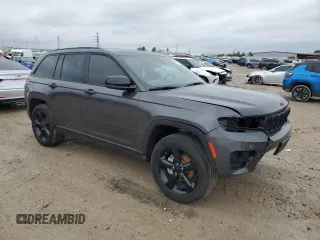2023 Jeep Grand Cherokee Altitude with VIN 1C4RJGAG7PC573429, listed as a Copart auction lot 42961295 with 9,704 mi miles and Salvage title. Bid and sale history available at DreamBid. Image 4.
