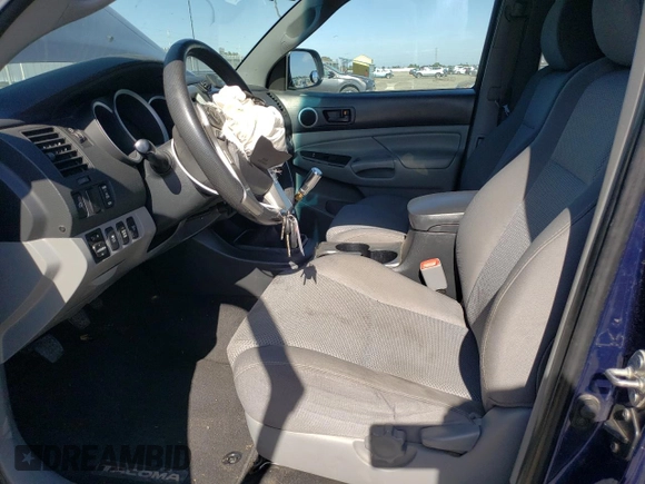 2014 Toyota Tacoma with VIN 5TFUU4EN4EX093945, listed as a Copart auction lot 58975405 with 111,695 mi miles and Salvage title. Bid and sale history available at DreamBid. Image 7.