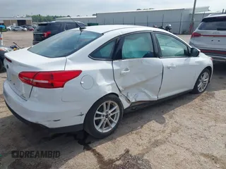 2015 Ford Focus SE with VIN 1FADP3F22FL376042, listed as a IAAI auction lot 42283236 with 76,675 mi miles and . Bid and sale history available at DreamBid. Image 4.