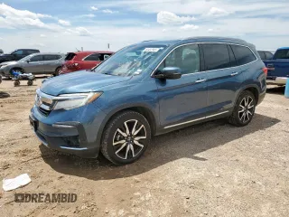 2020 Honda Pilot Touring 8-Passenger with VIN 5FNYF5H9XLB000448, listed as a Copart auction lot 60402965 with 58,596 mi miles and Clean title. Bid and sale history available at DreamBid. Image 1.