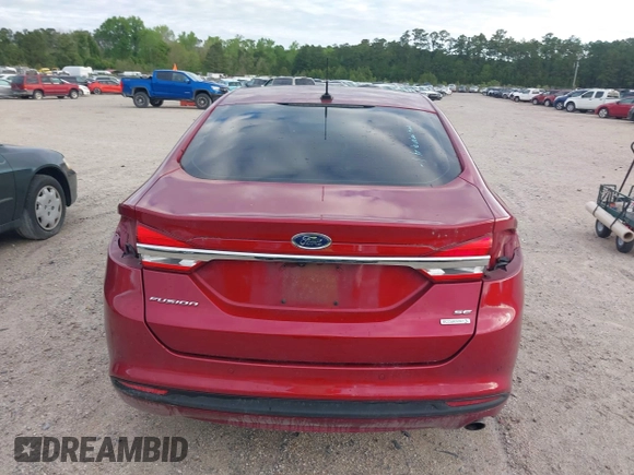 2017 Ford Fusion SE z VIN 3FA6P0HD2HR401046, wystawiony jako IAAI lot #41965539 z przebiegiem 92 664 mil mil oraz . Historia ofert i sprzedaży dostępna na DreamBid. Obrazek 16.