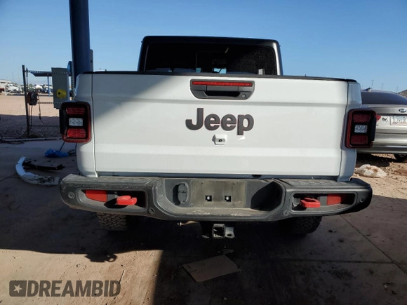 2022 Jeep Gladiator Rubicon with VIN 1C6JJTBG3NL103293, listed as a Copart auction lot 45599755 with Not provided miles and Salvage title. Bid and sale history available at DreamBid. Image 6.