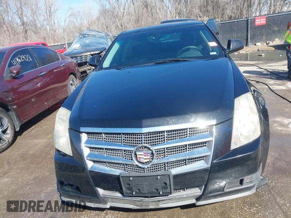 2009 Cadillac CTS AWD z VIN 1G6DH577290166448, wystawiony jako IAAI lot #41751610 z przebiegiem 158 378 mil mil oraz . Historia ofert i sprzedaży dostępna na DreamBid. Obrazek 12.