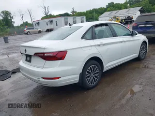 2021 Volkswagen Jetta S z VIN 3VWC57BU9MM103778, wystawiony jako IAAI lot #42493041 z przebiegiem 74 723 mil mil oraz . Historia ofert i sprzedaży dostępna na DreamBid. Obrazek 4.