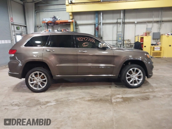 2020 Jeep Grand Cherokee Summit with VIN 1C4RJFJG1LC170714, listed as a IAAI auction lot 42247702 with 78,614 mi miles and . Bid and sale history available at DreamBid. Image 14.
