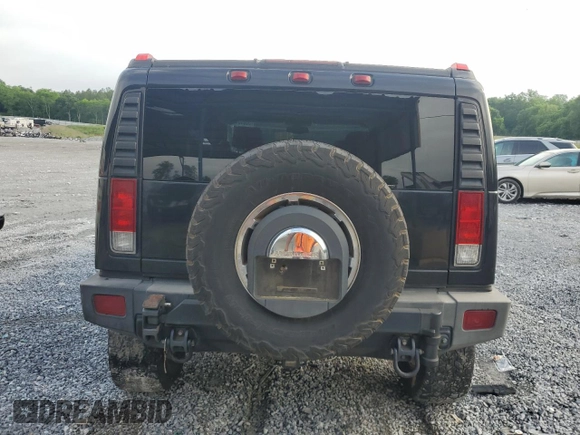 2006 Hummer H2 z VIN 5GRGN23U66H116855, wystawiony jako Copart lot #56010175 z przebiegiem 217 798 mil mil oraz Tytuł czysty. Historia ofert i sprzedaży dostępna na DreamBid. Obrazek 6.