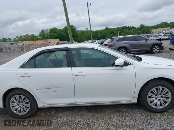 2012 Toyota Camry L z VIN 4T1BF1FK1CU532002, wystawiony jako IAAI lot #42215124 z przebiegiem 209 642 mil mil oraz . Historia ofert i sprzedaży dostępna na DreamBid. Obrazek 13.