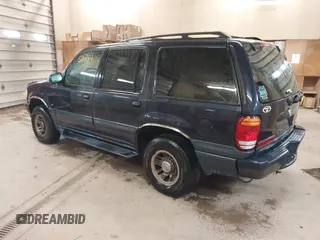 1999 Mercury Mountaineer z VIN 4M2DU55P0XUJ08169, wystawiony jako IAAI lot #42150344 z przebiegiem 164 994 mil mil oraz . Historia ofert i sprzedaży dostępna na DreamBid. Obrazek 3.