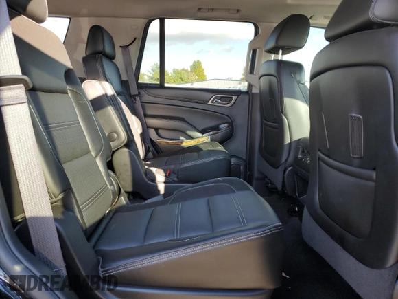 2016 GMC Yukon Denali with VIN 1GKS1CKJXGR329103, listed as a Copart auction lot 75492494 with 124,374 mi miles and Salvage Title. Bid and sale history available at carsss.com. Image 11.