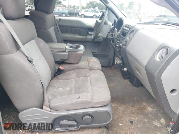 2004 Ford F-150 STX with VIN 1FTRX12W74FA06102, listed as a IAAI auction lot 42578235 with 300,791 mi miles and . Bid and sale history available at DreamBid. Image 5.