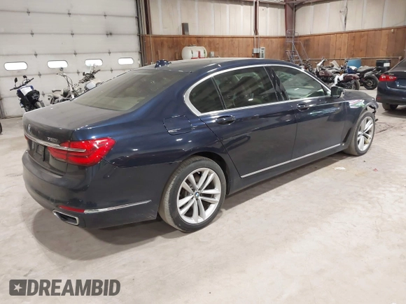 2017 BMW 7 Series ALPINA B7 xDrive with VIN WBA7F2C51HG422682, listed as a IAAI auction lot 42341486 with 117,722 mi miles and . Bid and sale history available at DreamBid. Image 4.
