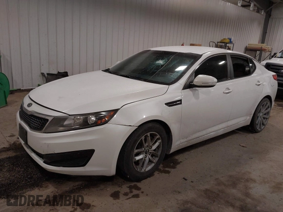 2011 Kia Optima LX with VIN KNAGM4A7XB5121112, listed as a IAAI auction lot 41384717 with 140,821 mi miles and . Bid and sale history available at carsss.com. Image 2.