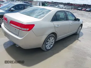2010 Lincoln MKZ with VIN 3LNHL2GCXAR654796, listed as a IAAI auction lot 42452744 with 127,053 mi miles and . Bid and sale history available at DreamBid. Image 4.