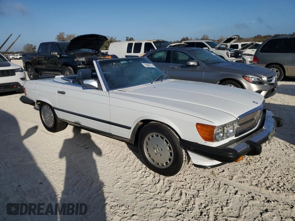 1989 Mercedes-Benz 560 SL с VIN WDBBA48D4KA104474, выставлен на аукционе Copart как лот 76584374 с пробегом 118 252 миль миль и Списание • Salvage title. История ставок и продаж доступна на DreamBid. Изображение 4.