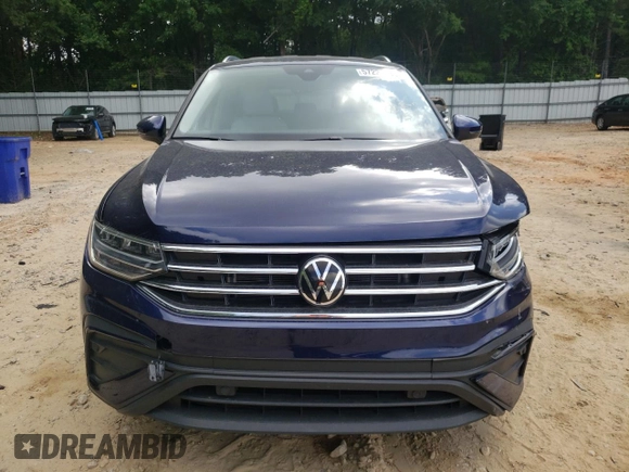2023 Volkswagen Tiguan SE with VIN 3VV3B7AX9PM102224, listed as a Copart auction lot 57221585 with 21,202 mi miles and Salvage title. Bid and sale history available at DreamBid. Image 5.