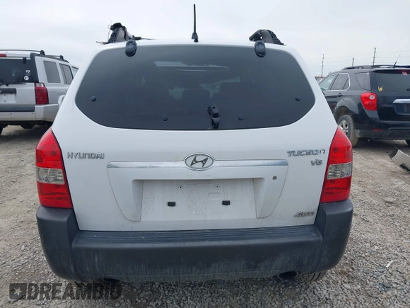 2006 Hyundai Tucson GLS with VIN KM8JN72D26U322893, listed as a IAAI auction lot 41882842 with 116,972 mi miles. Bid and sale history available at carsss.com. Image 16.